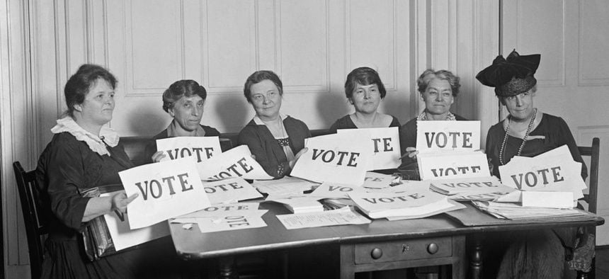 National League of Women Voters hold up signs reading, 'VOTE', Sept. 17, 1924.